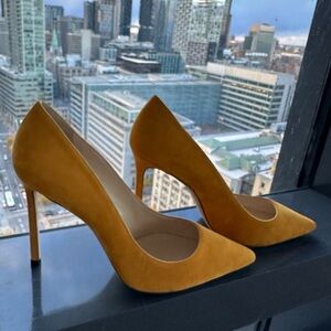 Jimmy Choo size 9 (40 1/2), yellow high heel shoes. New. Never worn.